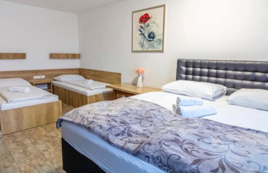 4-Bettzimmer mit Balkon