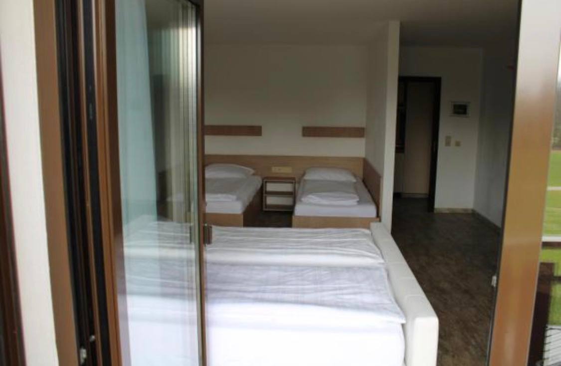 4-Bettzimmer mit Balkon